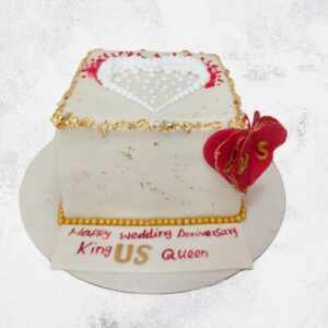 "King and Queen Anniversary 1 Kg Cake, featuring a regal design fit for a royal celebration."