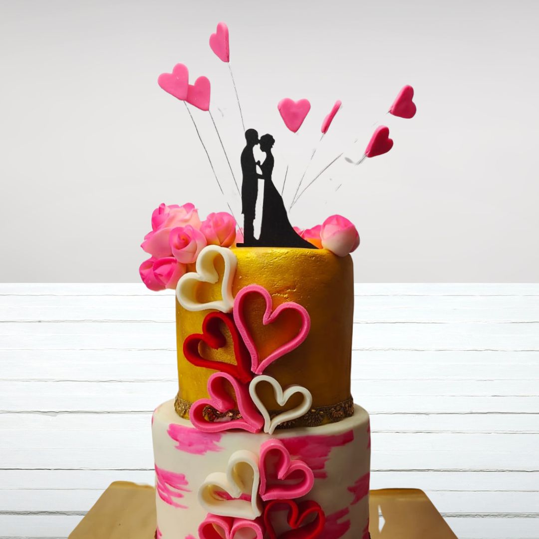 Perfect couple engagement cake 4 Kg featuring fondant silhouettes of a couple, surrounded by heart designs and "Perfect Pair" topper.