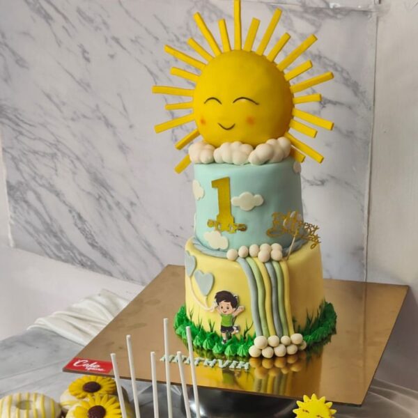 Sun Shine First Birthday Party Cake 4 Kg, featuring bright and cheerful sun decorations, perfect for a sunny and joyful celebration.