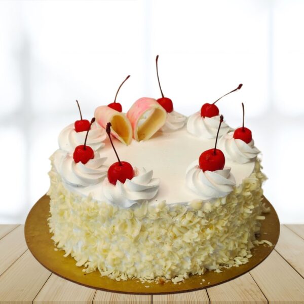 White Chocolate with cherries filled inside and full fresh cherries on top by Cake Square Chennai.