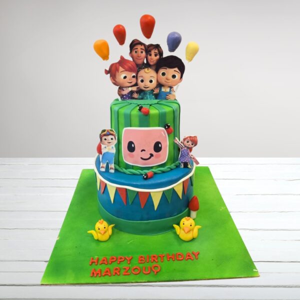 Amazing 4 kg Cocomelon 2-Tier Birthday Cake with character figurines, colorful fondant details, and musical theme elements