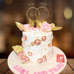 "Anniversary Cake 1 Kg with Pink Roses, featuring a beautiful floral design ideal for romantic celebrations."