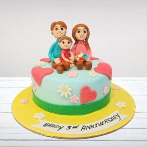 "Cute Couple Family Birthday Cake 1 Kg, featuring an adorable design perfect for celebrating family milestones."