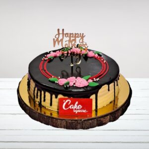 1 kg Elegant Gold Chocolate Cake Mothers Day Cake with luxurious gold decorations for Mother's Day.