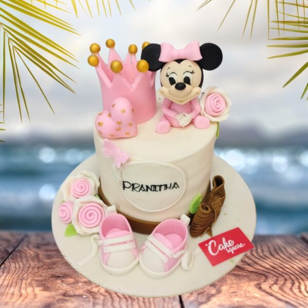 "Cute Minnie First Birthday Cake 1 Kg. Round first birthday cake with Minnie Mouse theme and number one topper"