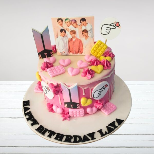 "Love BTS Theme Teenage Girls Birthday Cake 1 Kg. BTS-themed birthday cake with band logo and purple color scheme"