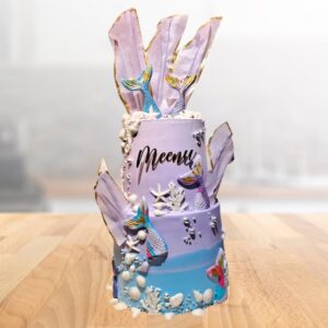 Premium Purple Mermaid First Birthday Cake 5 kg. A luxurious purple mermaid-themed birthday cake for a little girl.