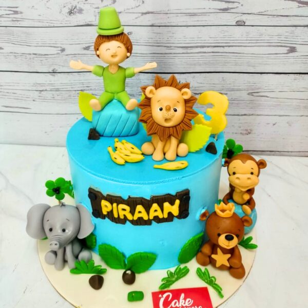 Amazing Animals Birthday Cake 2 KgLively 2kg birthday cake featuring an assortment of colorful animal figurines, jungle-inspired decorations, and playful designs