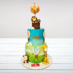 Awesome Animal Theme Birthday Cake 5 kg with diverse wildlife figurines, jungle scenery, and vibrant safari-inspired decorations