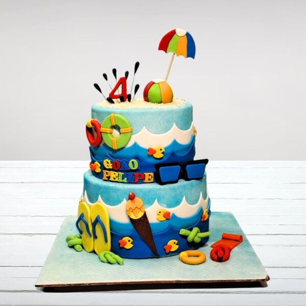 "Beach Theme Kids Birthday Cake 5 Kg with vibrant beach decorations, perfect for a sunny and fun birthday celebration."