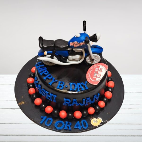 Best Royal Enfield Bike Birthday cake 1 Kg shaped like a Royal Enfield motorcycle, with realistic features and classic bike design elements