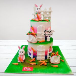 "Bunnies Theme First Birthday Cake 5 Kg with adorable bunny decorations, perfect for a sweet and charming first birthday celebration."