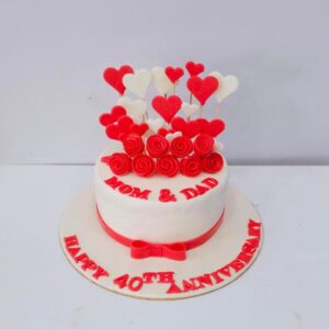 "Parents Wedding Anniversary Cake 1 Kg, featuring a classic design ideal for celebrating a special milestone."