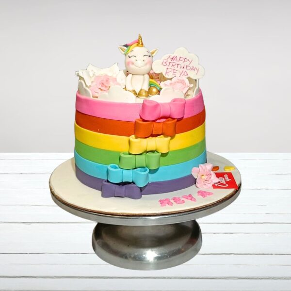 "Unicorn Rainbow Perfect Girls Birthday Cake, 2 Kg, with magical unicorns, colorful rainbows, and whimsical decorations, ideal for a dreamlike celebration."