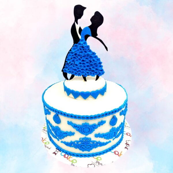 beautiful cake jewelled with blue artisitic fondant decorations with couple dancing in cake topper Blue Love 1 Kg anniversary cake by cake square