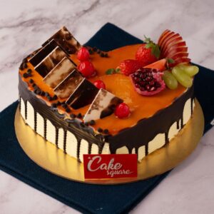 a butterscotch cake filled with caramel on top and decorated with chocolate garnish is our Heart shape ButterScotch 1 Kg Birthday Cake. Made by Cake Square Team.