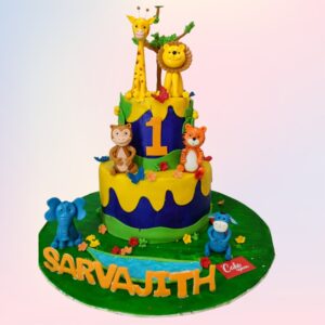 Animal Style First Birthday Cake 4 Kg featuring various animal decorations, perfect for a child’s first birthday.