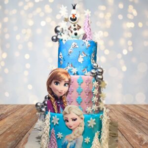 "Anna and Elsa Frozen Theme Kids Birthday Cake 7 Kg featuring enchanting Frozen decorations with Anna and Elsa, perfect for a magical and grand birthday celebration."