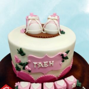 "It’s A Girl Baby Shower Cake 1kg with sweet pink designs, perfect for celebrating a baby girl’s arrival."