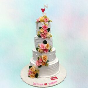 Impressive Big 4 Tier customised Wedding Cake featuring multiple large tiers with personalized designs, colors, and unique elements tailored to the couple's preferences, meticulously crafted by Cake Square Chennai.