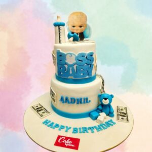 Boss Baby themed birthday cake with suit-wearing baby figurine, 3 kg