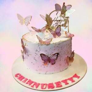 "Butterfly Theme Girls Birthday Cake 1kg featuring vibrant butterfly decorations, ideal for a colorful and joyful birthday celebration."