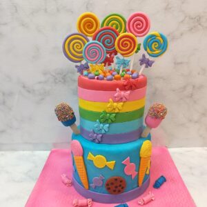 "Candy Colourful Kids First Birthday Cake 5 Kg with vibrant candy decorations, perfect for a sweet and colorful first birthday celebration."