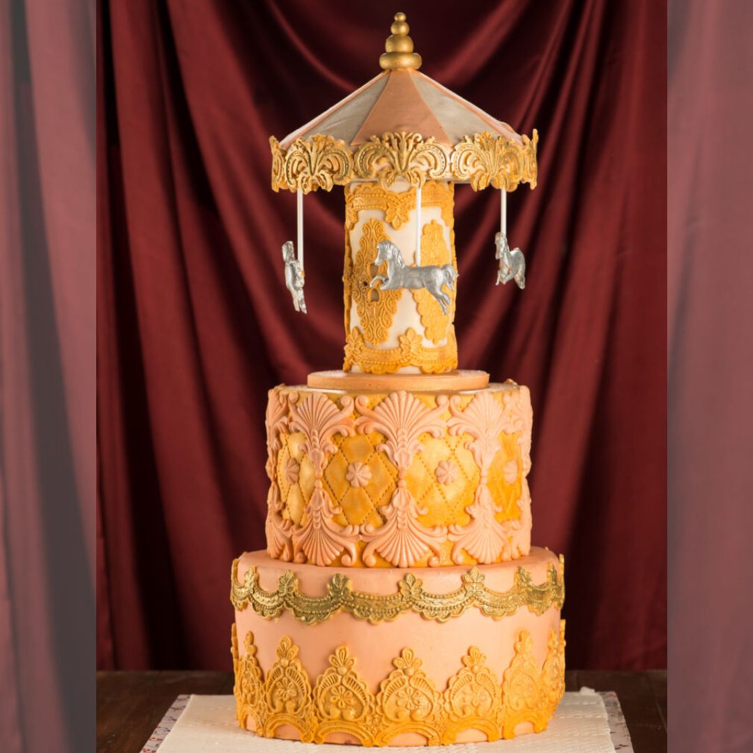 "Carousel Theme 5 Kg First Birthday Cake with a charming and intricate carousel design, perfect for a grand first birthday celebration."