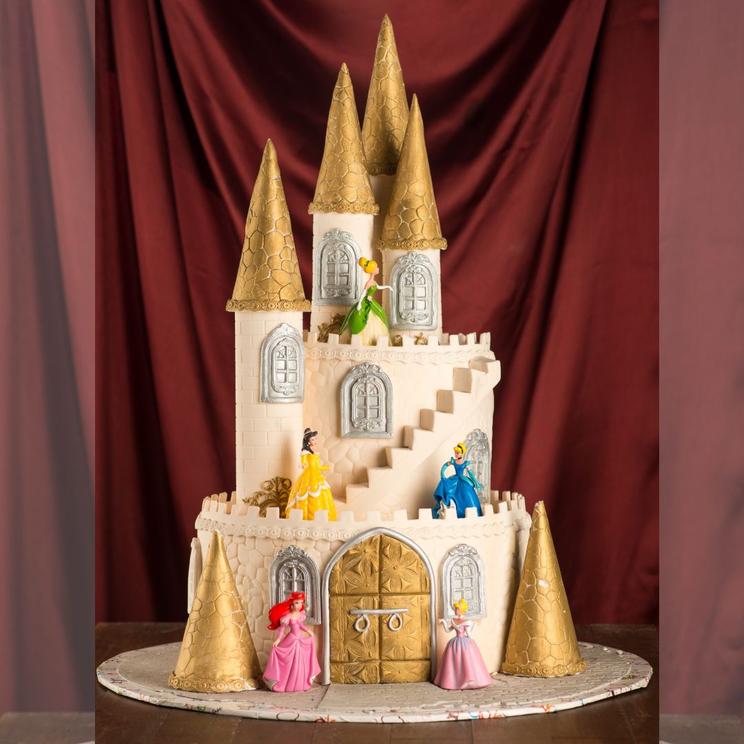 "Castle Girls First Birthday Cake 5 Kg featuring an intricate castle design, perfect for a grand princess-themed first birthday celebration."