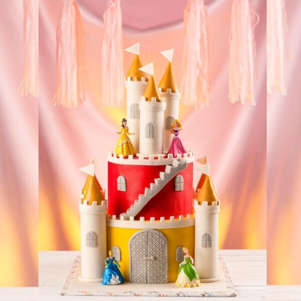 "Castle Theme Girls First Birthday Cake 5 Kg with a grand castle design, perfect for a royal first birthday celebration for girls."