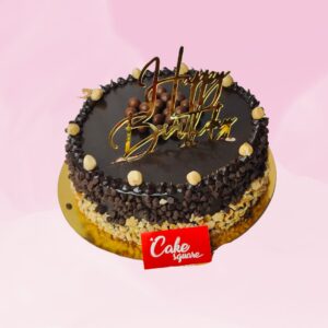 1 kg chocolate birthday cake with hazelnut flavoring and nut decorations.Made by Cake Square Team.