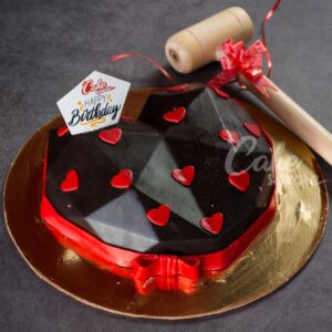 Decadent chocolate heart-shaped 1/2kg pinata cake with surprise candy filling