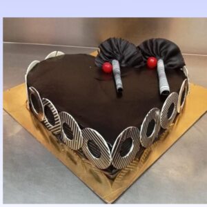 1 kg heart-shaped anniversary cake with chocolate truffle flavor.Made by Cake Square Team.