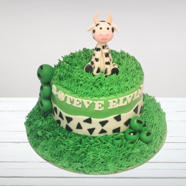 "Cow Theme Kids Birthday Cake 1 Kg featuring adorable cow decorations, perfect for a fun and playful birthday celebration."