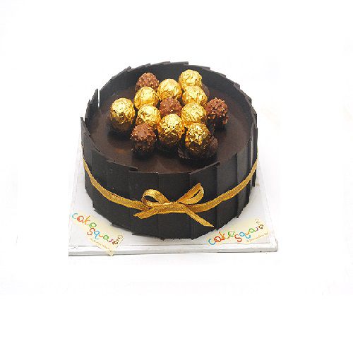 1 kg chocolate birthday cake inspired by Ferrero Rocher, with hazelnut decorations. Made by Cake Square Team.