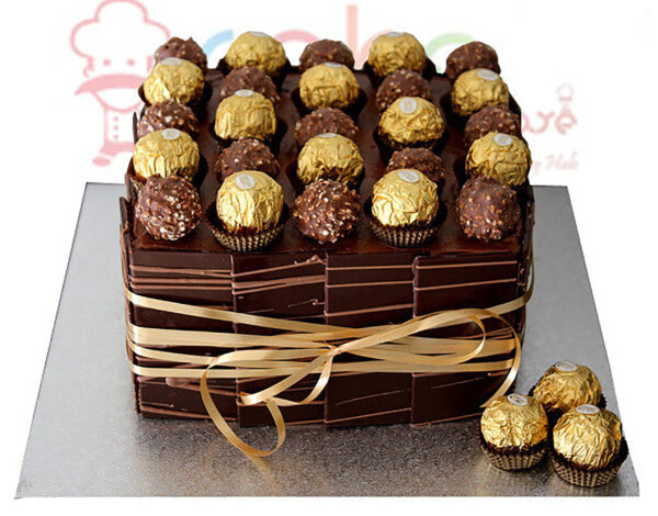 1 kg birthday cake with Ferrero Rocher chocolate theme and decorations.Made by Cake Square Team.