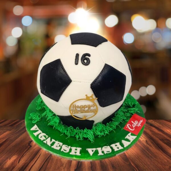 Foot Ball Pinata 1kg Boys Birthday Cake is shaped like a realistic football, decorated with fondant laces and filled with sports-themed treats.