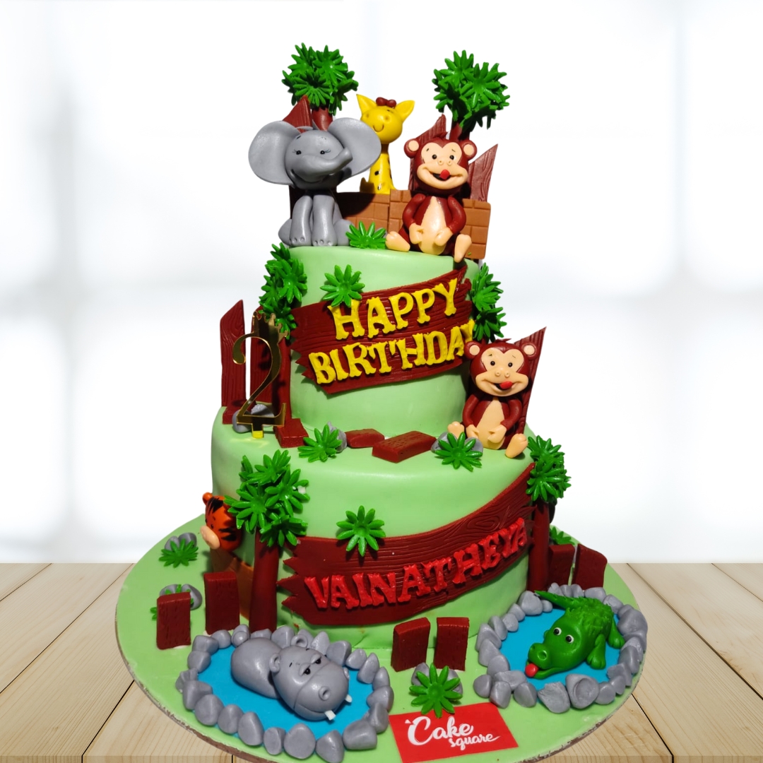 "Forest Animal Theme Kids First Birthday Cake 4 Kg featuring adorable forest animals like deer, foxes, and owls, perfect for a charming and nature-inspired first birthday celebration."