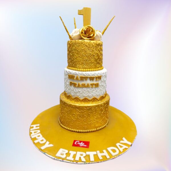 "Gold Kids First Birthday Cake 7 Kg with a luxurious gold design, perfect for a grand and opulent first birthday celebration."