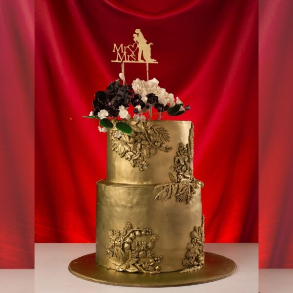 Opulent Gold Wedding cake 4 Kg Cake featuring multiple tiers adorned with gold leaf, intricate golden designs, and edible metallic accents, created by Cake Square Chennai.