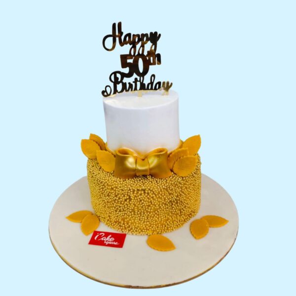 "Golden Birthday Cake 4 Kg 2 Tier featuring an elegant gold design, perfect for a sophisticated and luxurious birthday celebration."