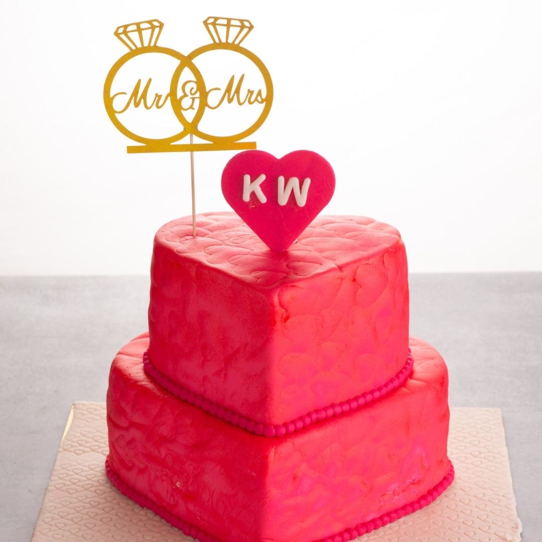 Romantic Heart Shape Engagement Wedding Cake 4 Kg with multiple tiers forming a heart, adorned with delicate sugar flowers and intricate piping, crafted by Cake Square Chennai.