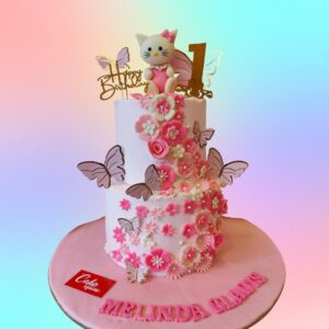 Lovely Hello Kitty First Birthday Cake 5 Kg,featuring the iconic character and pink decorations, perfect for a little girl’s celebration.