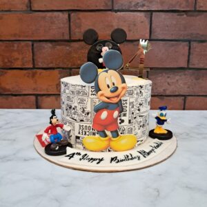 "Mickey Theme Kids Birthday Cake 1 Kg with cheerful Mickey Mouse decorations, perfect for a classic and fun-filled birthday celebration."