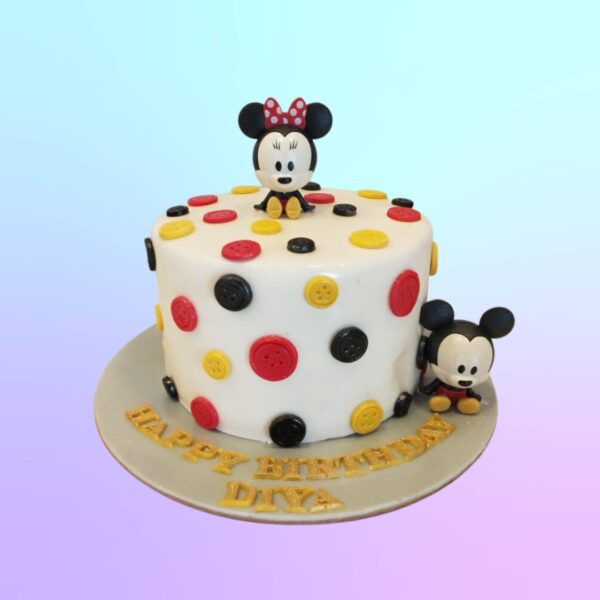 "Minnie Theme Girls Birthday Cake 1 Kg with adorable Minnie Mouse designs, perfect for a Minnie-themed birthday celebration."