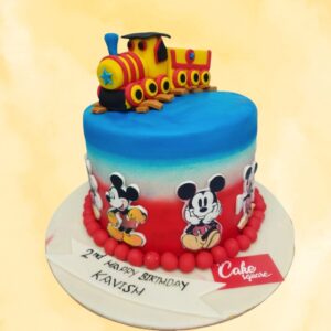 Minnie Train Theme Birthday Cake 1 Kg featuring Minnie Mouse driving a pink locomotive