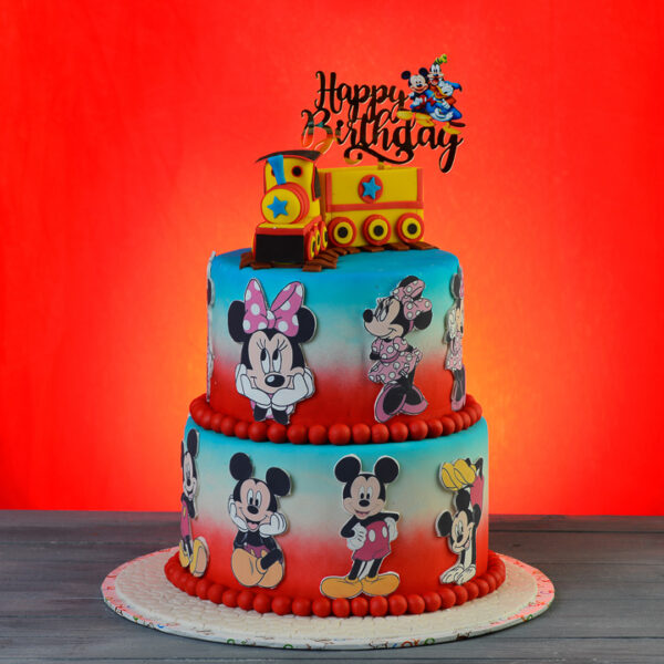 "Minnie Train Theme Birthday Cake 2tier 4kg featuring a charming Minnie Mouse train design, ideal for a magical and whimsical birthday celebration."