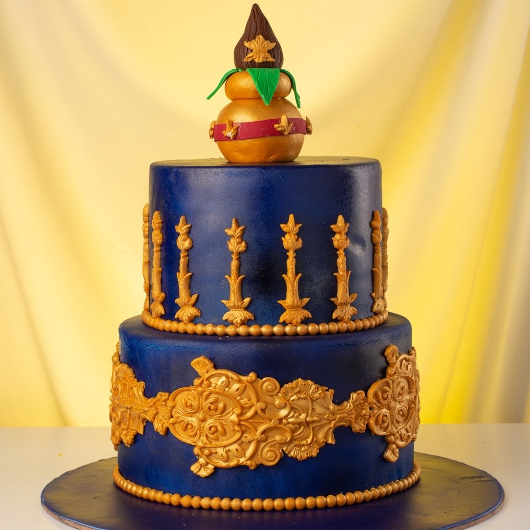 Elegant Muhurth Kalas 4 kg Wedding engagement Cake with intricate traditional designs and auspicious symbols in gold and vibrant colors, created by Cake Square Chennai.