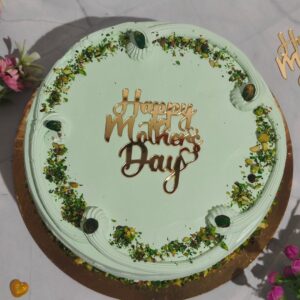 1 kg birthday cake with pistachio flavor and nut decorations. Made by Cake Square Team.