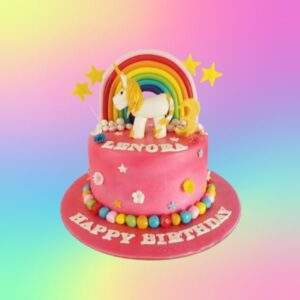 "Rainbow Unicorn Theme Girls Birthday Cake 1 Kg with colorful rainbow and unicorn designs, perfect for a unicorn-themed birthday party."